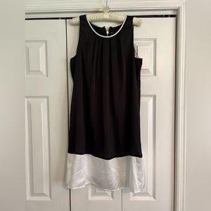 Ladies black dress with white trim